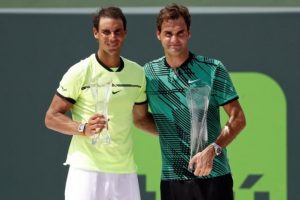 Apr 2, 2017; Key Biscayne, FL, USA; Rafael Nadal of Spain (L) and Roger Federer of Switzerland (R) hold the finalist and Butch Buchholz trophy, respectively, after their match in the men's singles championship of the 2017 Miami Open at Crandon Park Tennis Center. Mandatory Credit: Geoff Burke-USA TODAY Sports